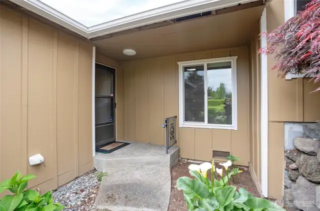 Private landscaped entry.