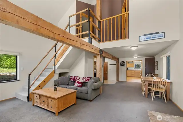 View from main area, you can see the staircase leading to the 2 upstairs bedrooms.