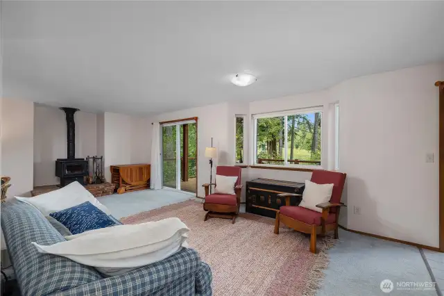 Great room that has a second sliding door leading to the trex deck.