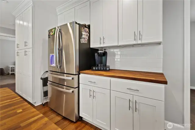 Newer cabinets with butcher block countertops and all newer stainless appliances are included.
