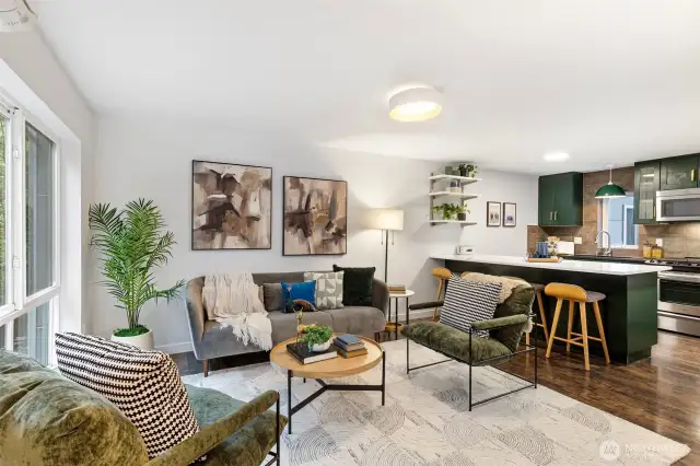 Welcome to this Beacon Hill townhouse! Living room and kitchen located on 2nd level