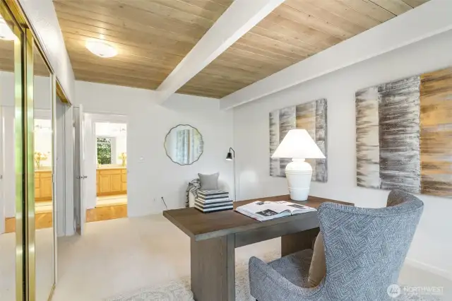 One of the three bedrooms in the main house.  Staged as an office.