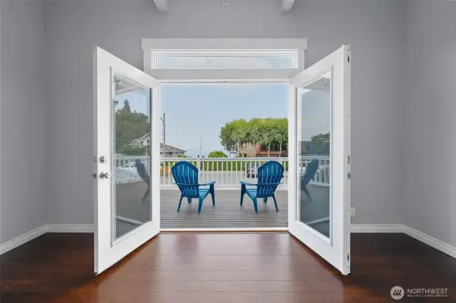 Throw open the double doors and soak in Commencement Bay from your deck