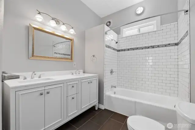Spacious full bath with double vanities