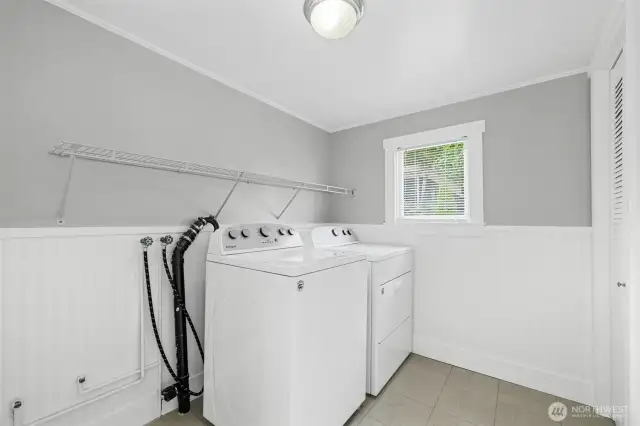 Convenient laundry room with washer and dryer included
