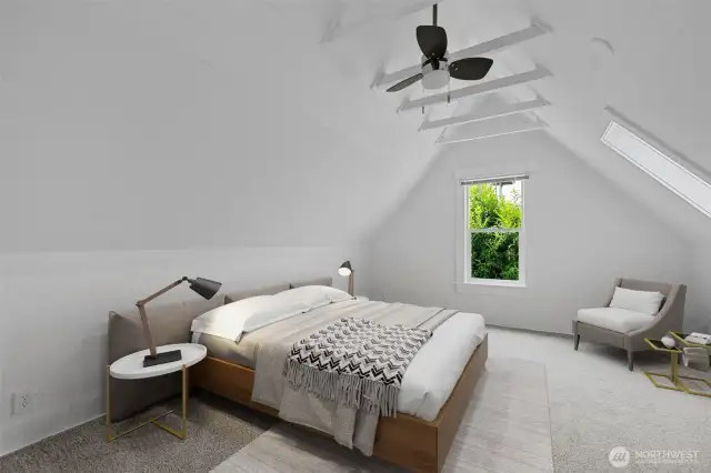 Bedroom #1 features a skylight and cathedral ceiling for added character.. Photo Virtually Staged