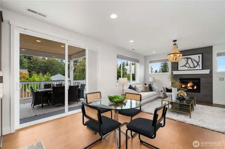 Breakfast nook next to kitchen with access to the private covered deck