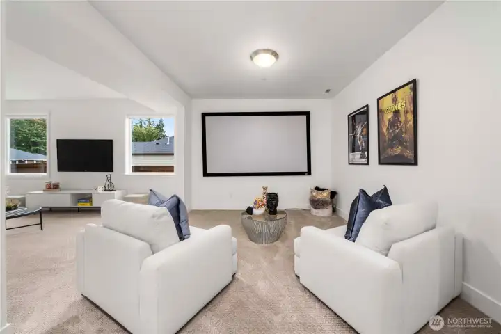 Finished basement with kitchenette, bedroom & bonus/entertainment space
