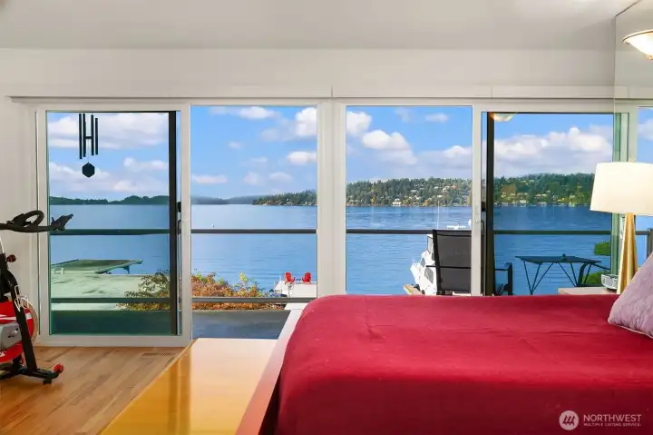 Primary bedroom spans width of house