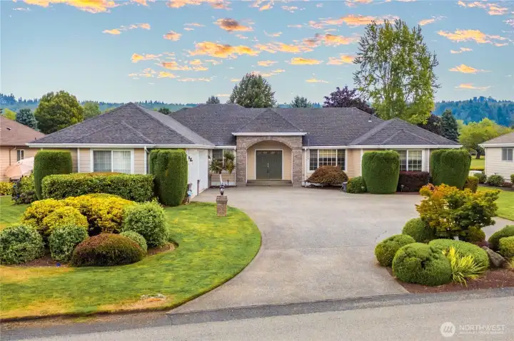 Stately Presence to this 2500 sq ft one level home located on High Cedars Golf Course.