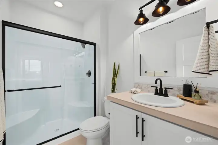Contemporary downstairs Guest Bath with Oversized Shower and Matte Black Finishes
