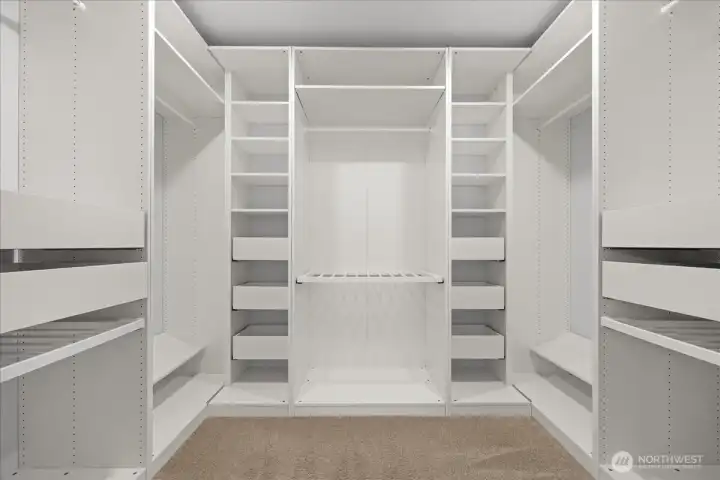 Spacious Closet in the Primary Bedroom with Built-In Custom Storage for Maximum Organization