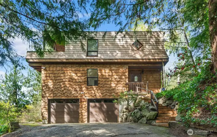 Hillcrest Haven in Holmes Point - 13133 66th Place NE, Kirkland. Two car garage with 240V EV charging outlet.