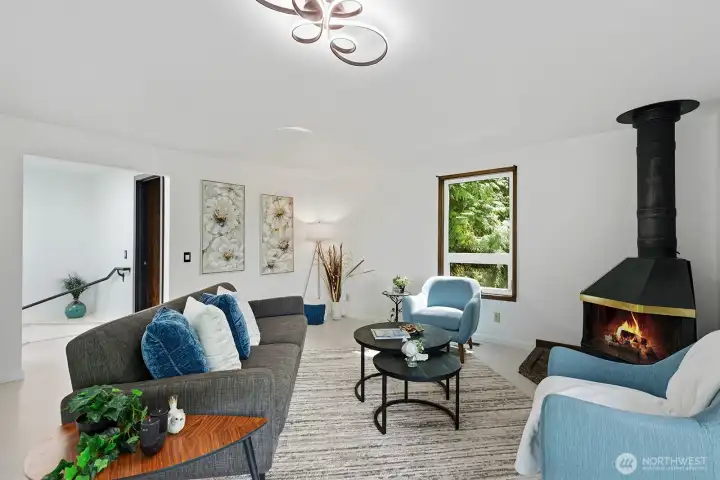 Beautifully remodeled home to suit today's lifestyle and comfort.  Entertainment sized living room with cozy corner fireplace.