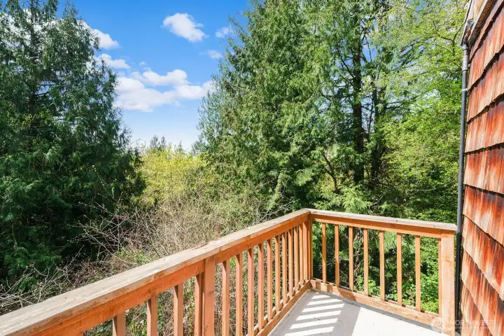 Private deck from the primary bedroom - a perfect spot to welcome the morning!