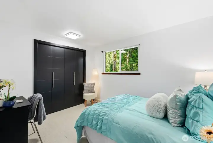 One of three bedrooms