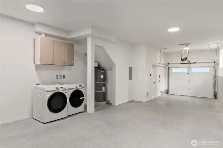 Utility room in spacious 2 car garage tandum