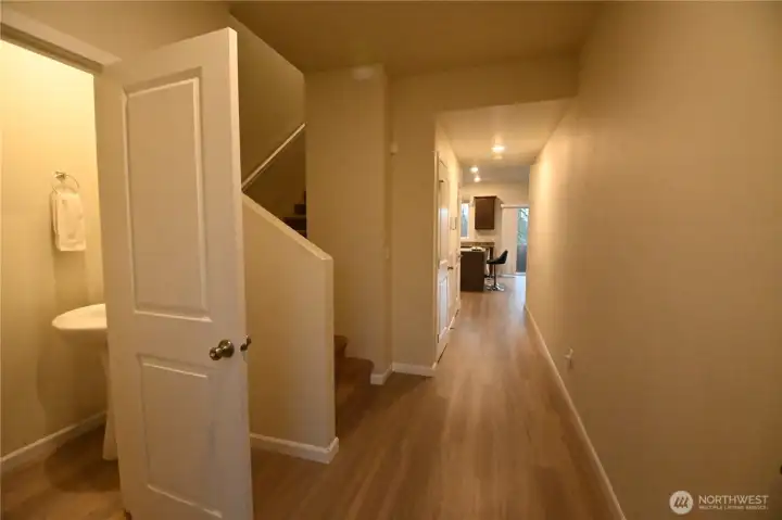 Entrance with half bath on main floor ~ walk in storage, like new floors & paint.