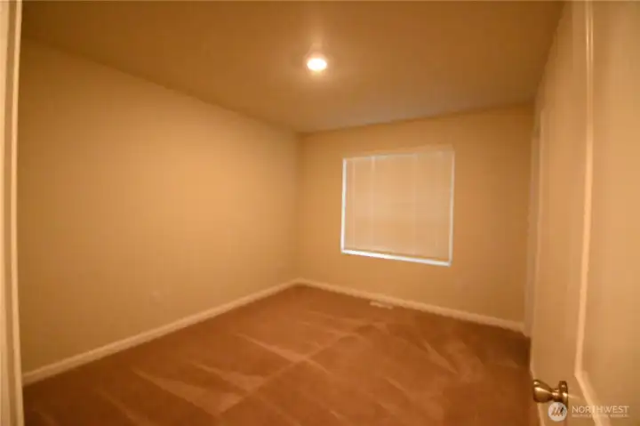 Bdrm #2 ~ presents in like-new condition and offers walk-in closet.