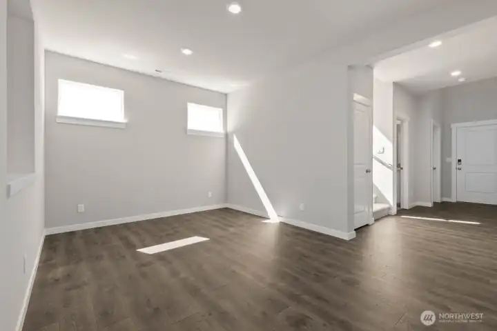 High set windows bring in lots of light and allow space for furniture.  Colors and finishes may vary.