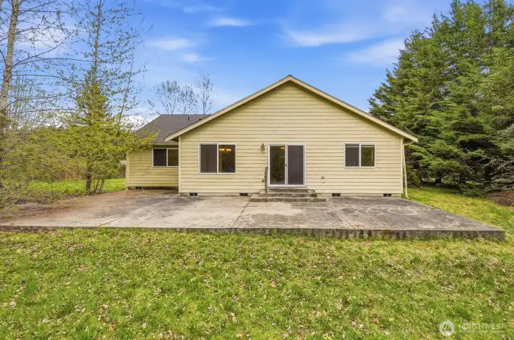 Back of the house with large patio