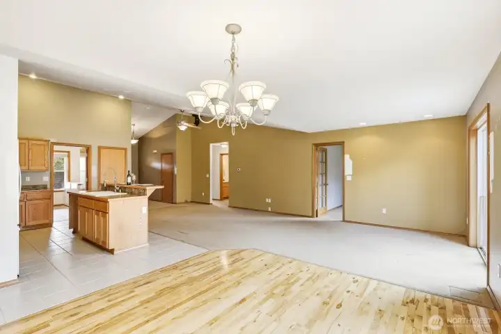 Large living room with sliding glass door to the patio