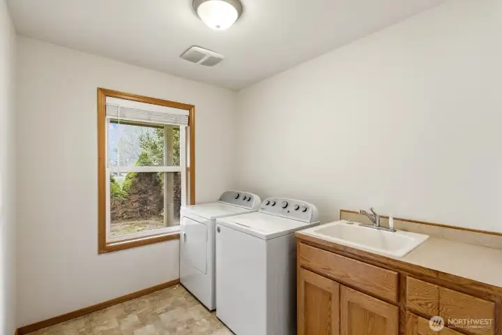 Utility room with sink and counter space