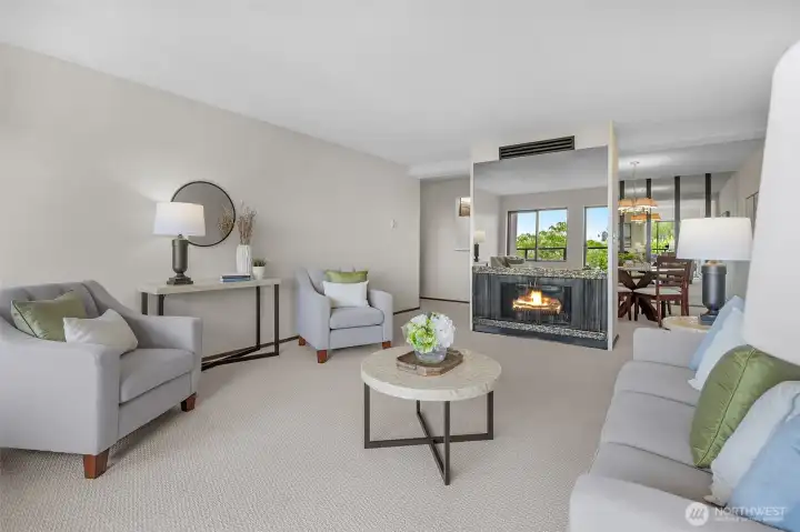 The warmth of home, framed by a stylish gas fireplace.