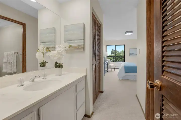 En-suite full bath offers convenience and privacy within the spacious bedroom retreat.