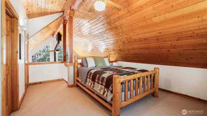 The loft/second bedroom features two closets and an attached 3/4 bath