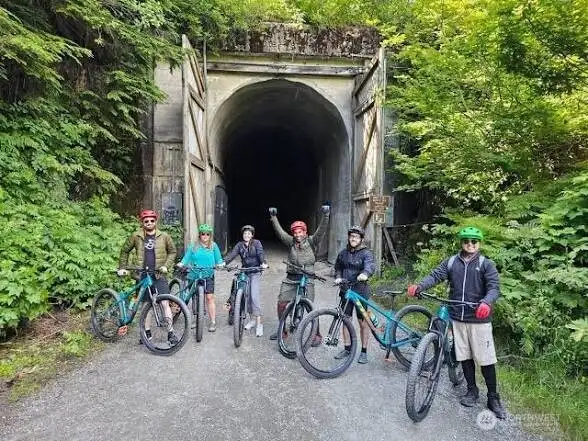 Iconic Snoqualmie Tunnel on the Palouse to Cascades State Park Trail is nearby for bike riding adventures.