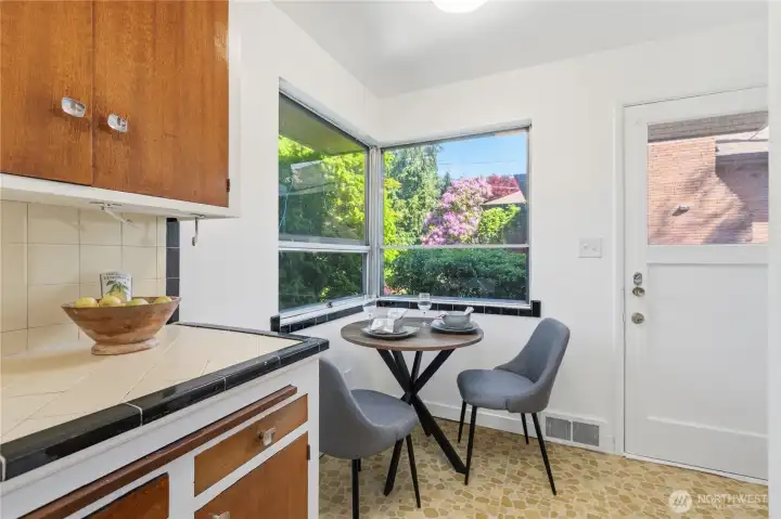 Kitchen with Breakfast nook and side exit.