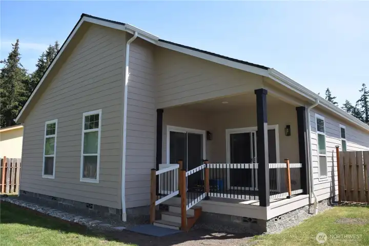Back deck with access to Master Bedroom and Family room Back deck with access to Master Bedroom and Family room