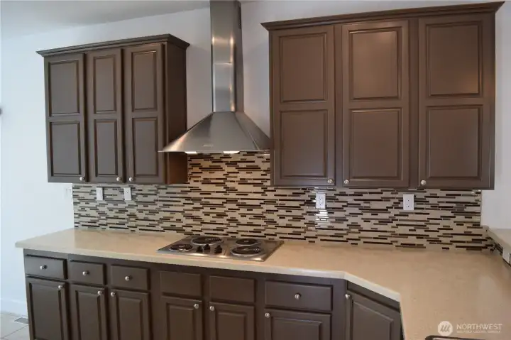 New backsplash and newly painted cabinets New backsplash and newly painted cabinets