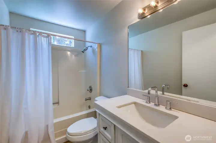 A full bathroom is located off the hallway. A full bathroom is located off the hallway.
