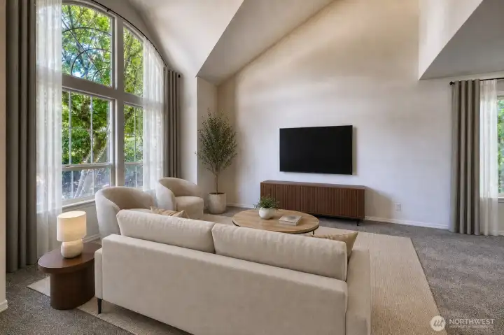 Virtually staged. Living room with vaulted ceilings, home has new carpet and new interrior paint. Virtually staged. Living room with vaulted ceilings, home has new carpet and new interrior paint.