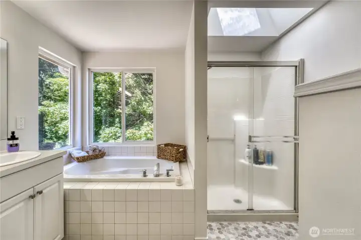 Primary ensuite with large skylight for additional light. Primary ensuite with large skylight for additional light.