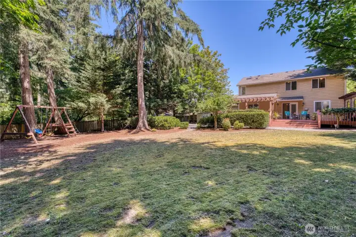 Nearly a half acre this large flat yard is exceptionally private. Nearly a half acre this large flat yard is exceptionally private.