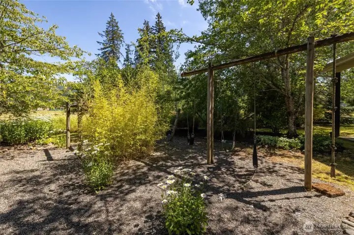 Between the house and garage is a custom built playground! Between the house and garage is a custom built playground!