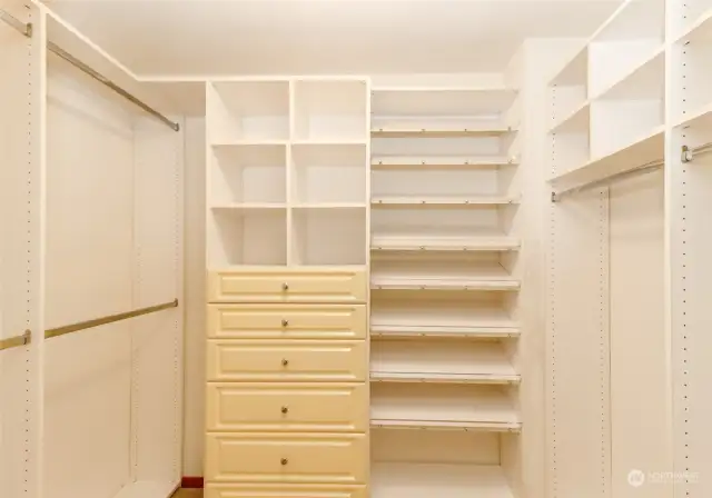 Customized, primary walk-in closet, with cedar and velvet lining