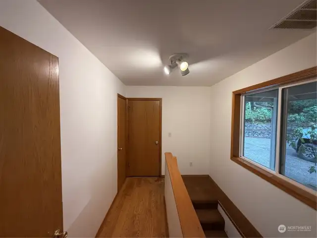 Hallway to garage and basement ADU