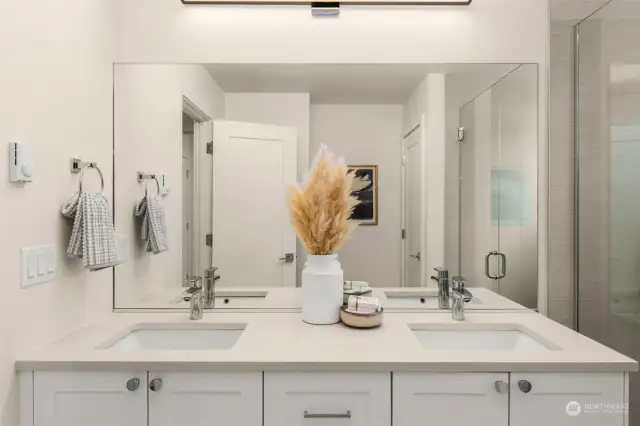 Double the convenience with this dual-sink vanity, featuring clean lines and elegant finishes.