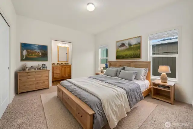 Primary Bedroom: Spacious primary suite with ensuite bath and large closet.