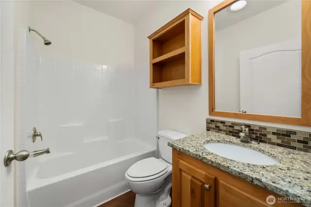 Bathrooms: Updated baths with modern finishes and ample storage.