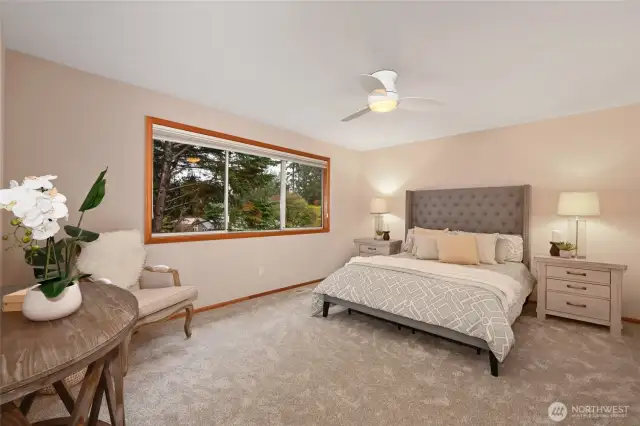 the private primary suite aces the back yard,