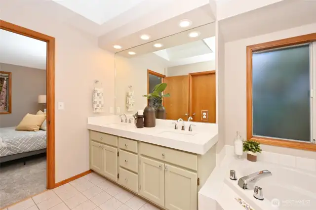 and a frosted window by the soaking tub for maximim natural light,