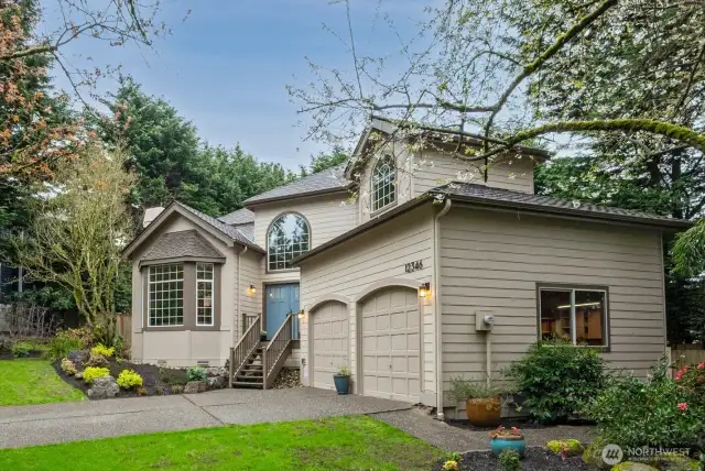 Head around the oversized 2-car garage with 8 ft tall doors and storage loft