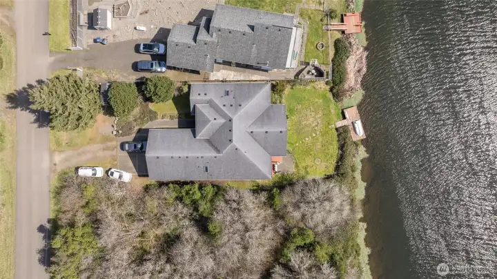 The true beauty of this home lies in the backyard, with peaceful canal views and a private dock.