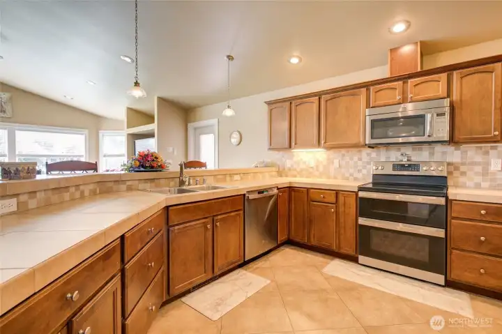Porcelain tile and backsplash are a beautiful feature.