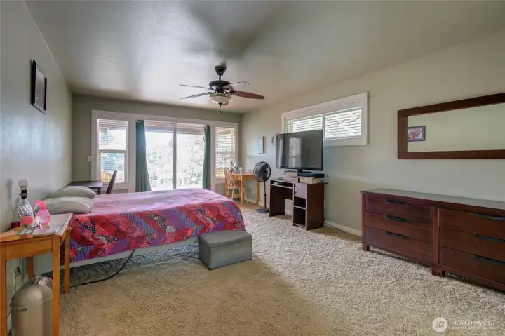 Covered rear deck is also accessed from the primary.